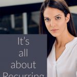 woman next to It’s all about Recurring Income sign